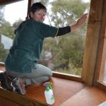Chris Barber Melaleuca Caretaker Cleaning windows of Bird Hide