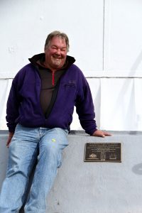 Wildcare's Shane Pinner & plaque Tasman Island lighthouse April 2015